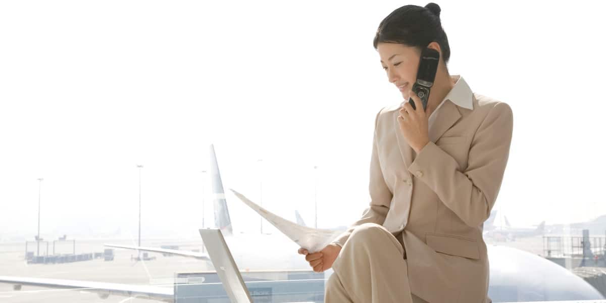 business traveler woman in a phone call