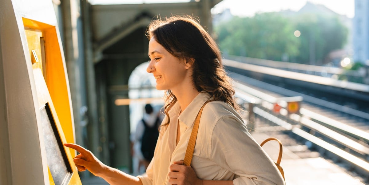 traveler using a kiosk