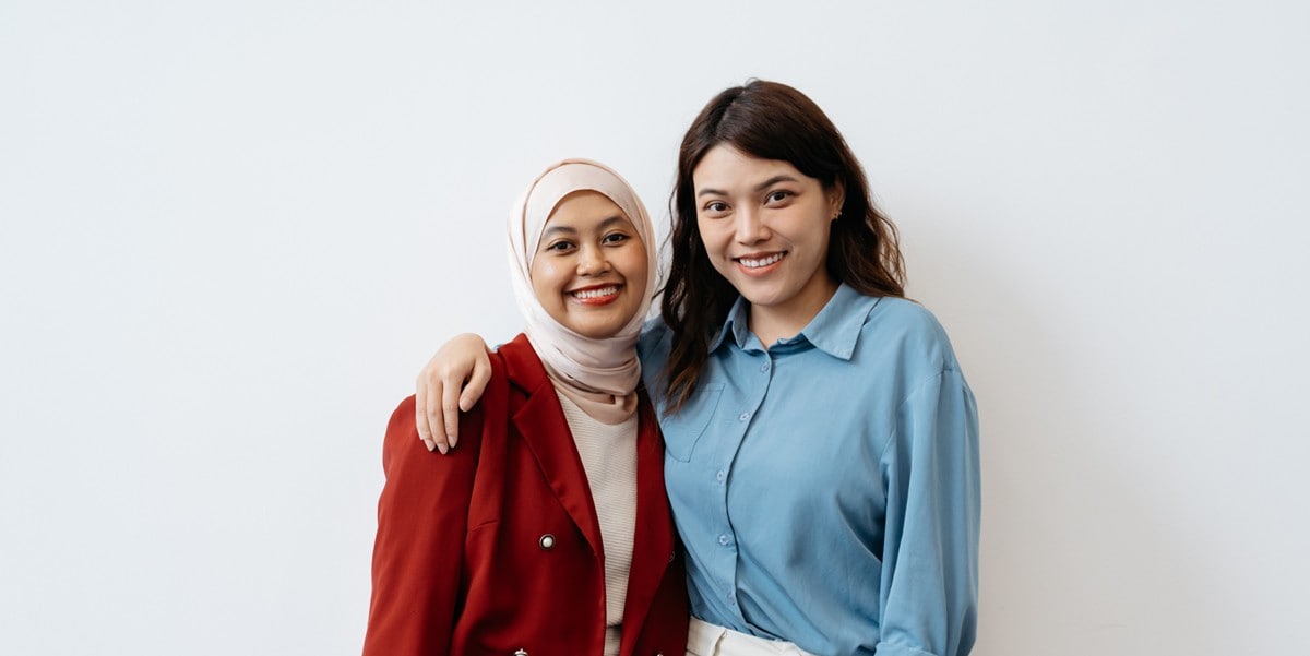two women smiling