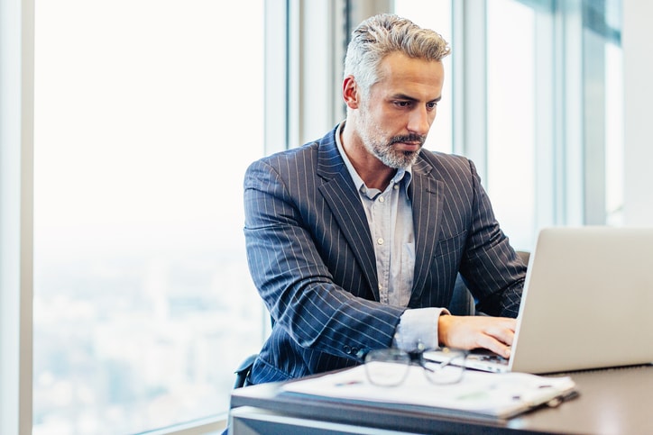 man working on laptop