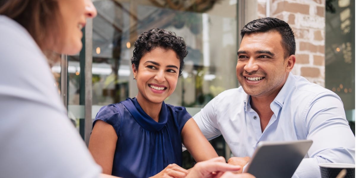 men smiling and talking