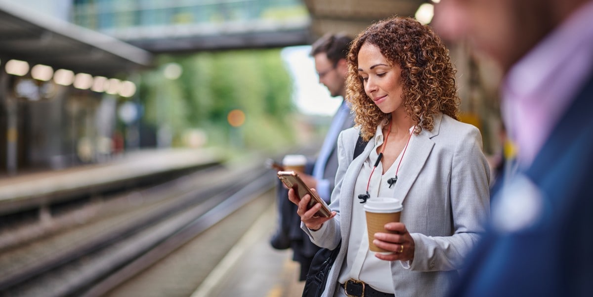 woman traveler waiting at train stop