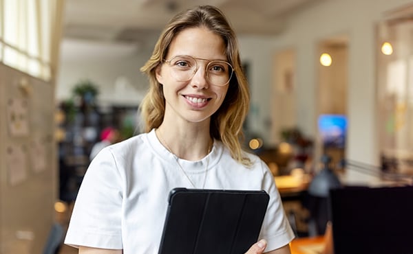 business professional holding tablet device