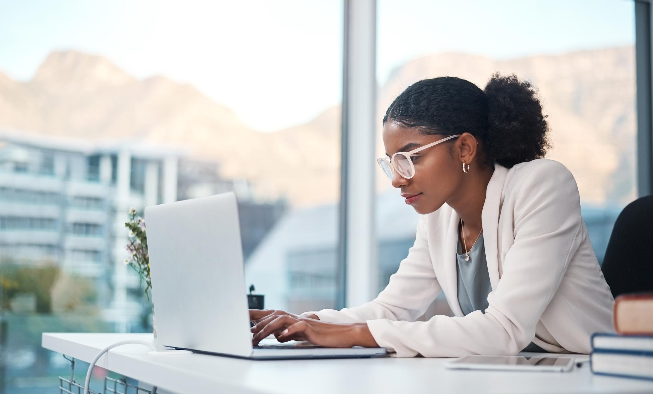 business professional working on laptop